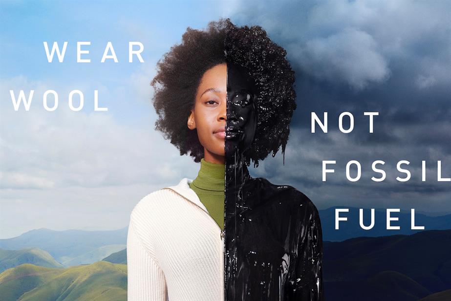 A woman with green hills in the background wearing a woollen jumper with one half of the image light and saying "wear wool" and the other half dark and saying "not fossil fuel' with the woman covered in oil